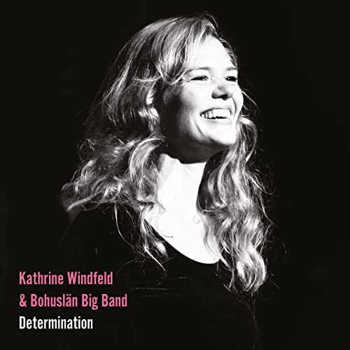 Black and white portrait of smiling woman, album cover for "Determination.