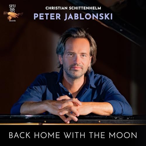 CD cover featuring pianist Peter Jablonski in a blue shirt.