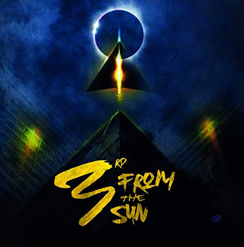 CD cover: dark blue and black with a solar eclipse and pyramid imagery.