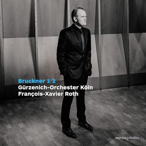 CD cover featuring conductor François-Xavier Roth in a black suit.