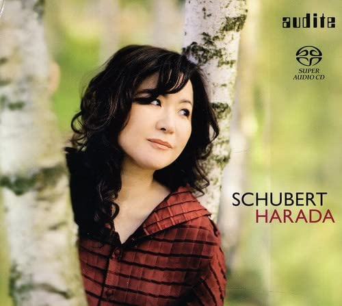 CD cover featuring pianist Hideyo Harada with birch trees background.