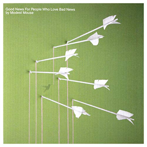Green album cover with paper arrows and a hummingbird silhouette.