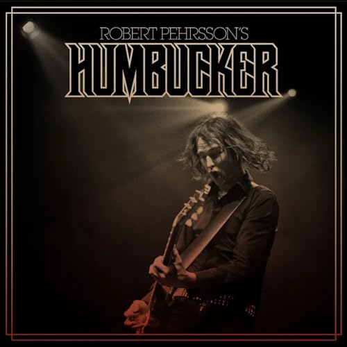 Record album cover featuring a guitarist in sepia tones.