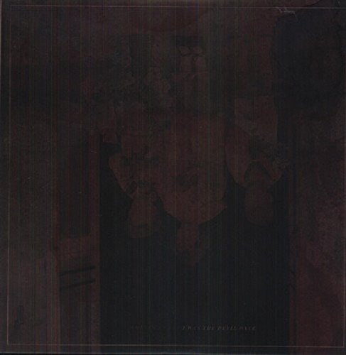 Dark, textured album cover with a faded, ghostly face in the center.