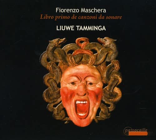 CD cover: a painted mask with snakes, dark background, text details.