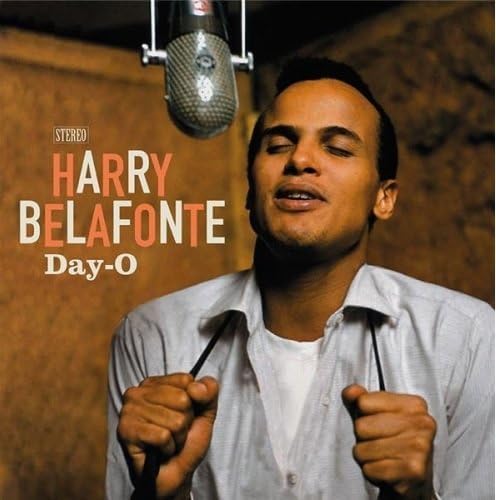 Harry Belafonte album cover, portrait with microphone, orange background.
