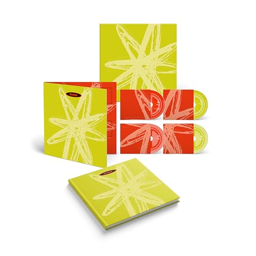 Four CDs and a booklet with a yellow starburst design.