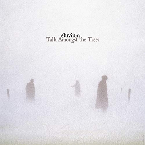 Album cover: foggy landscape with silhouetted figures, text "eluvium Talk Amongst the Trees".