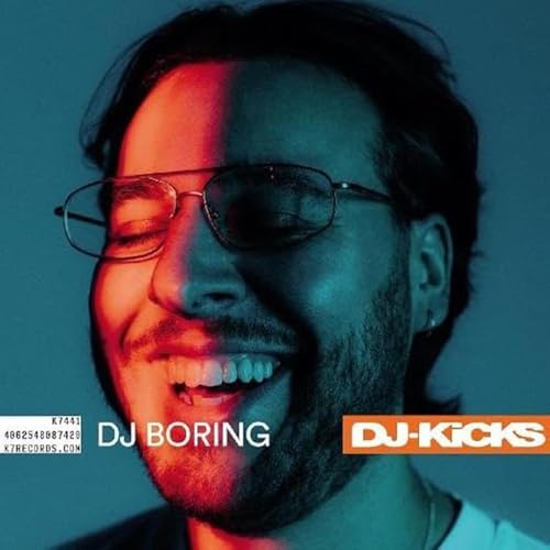 DJ Boring album cover featuring a man with glasses and colorful lighting.