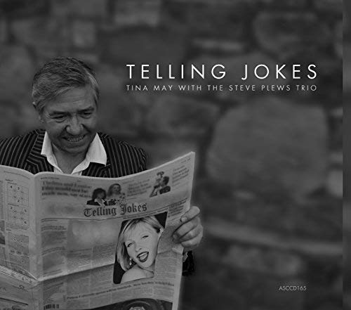 Black and white CD cover featuring a man reading a newspaper.