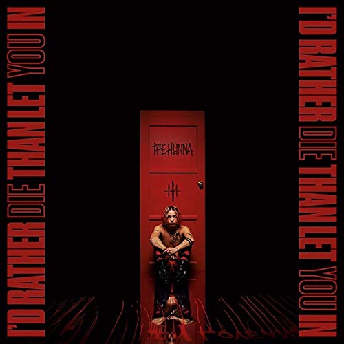 Album cover: person seated before a red door, dark background, text.