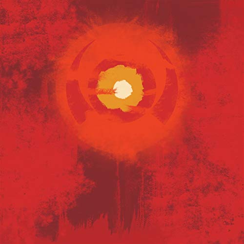 Red abstract album cover with a central, glowing circular design.