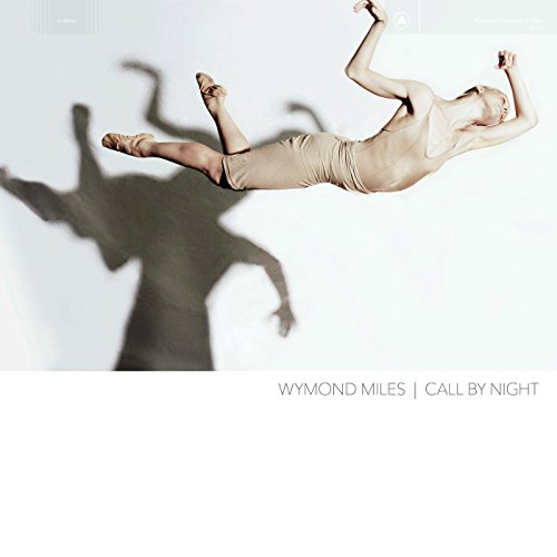 CD cover: Dancer in mid-air casting a long, distorted shadow.