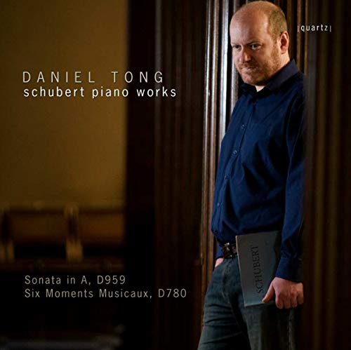 CD cover featuring pianist Daniel Tong leaning against a wood panel.