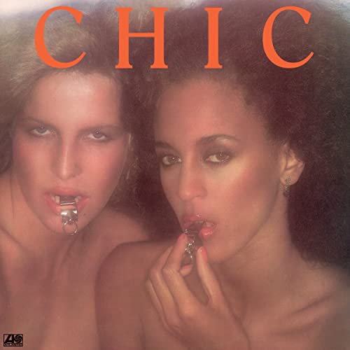 Album cover for Chic, featuring two women applying lipstick.