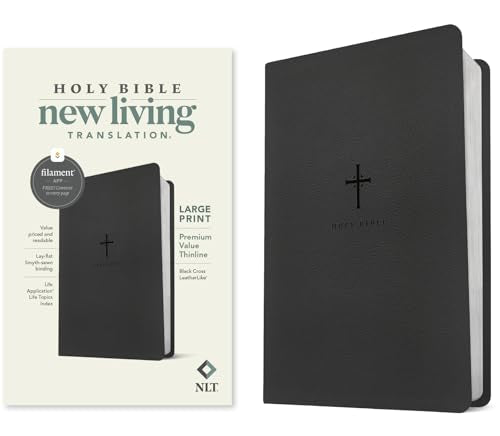 Black leatherlike Bible with a cross, shown with its packaging.