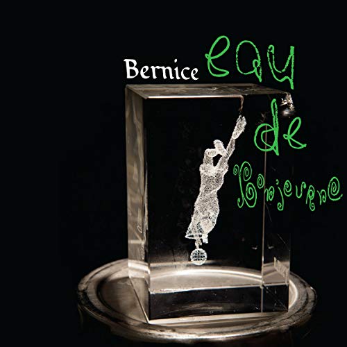 Vinyl record in a clear block with a silhouetted figure.