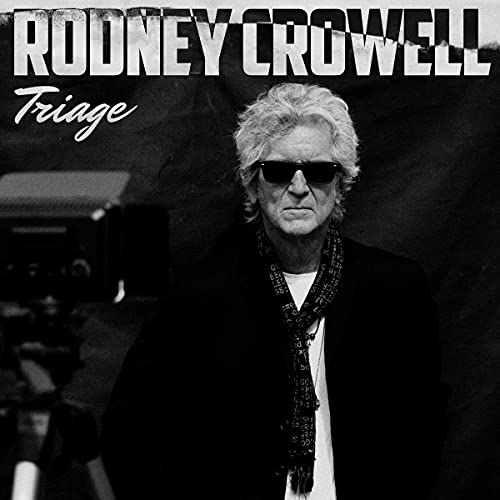 Black and white portrait of musician Rodney Crowell with sunglasses.