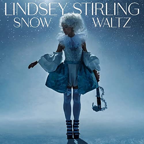 Lindsey Stirling album cover, “Snow Waltz”, featuring a woman in winter attire.