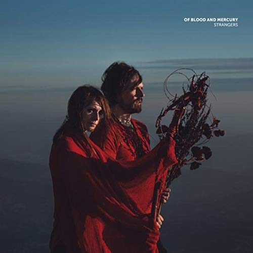 Album cover: couple in red coats with a thorny branch.