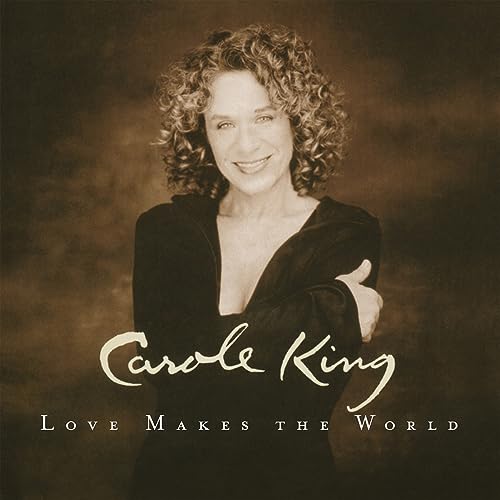Carole King portrait with album title "Love Makes The World" below.