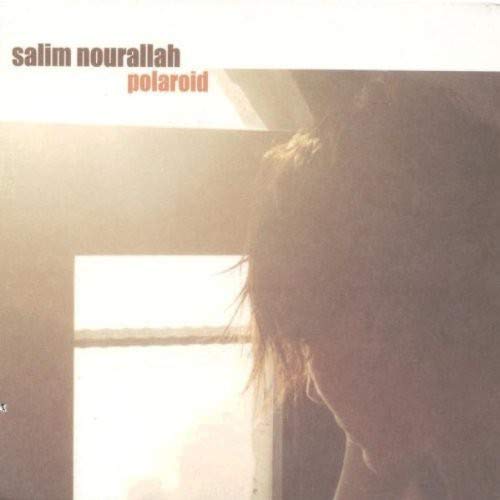 CD cover for “Polaroid” by Salim Nourallah, featuring a blurred face.