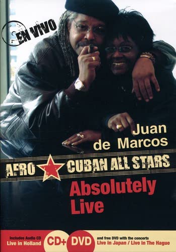 CD cover featuring two smiling musicians, Juan de Marcos González and a woman.