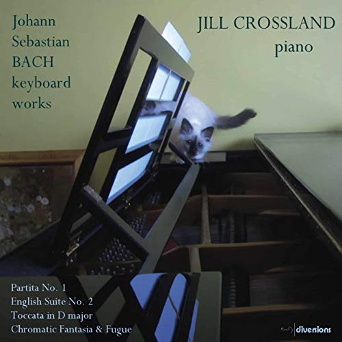 CD cover featuring a cat sitting amongst sheet music and a piano.