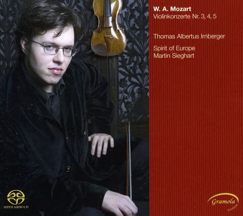CD cover featuring a violinist and a violin against a patterned background.