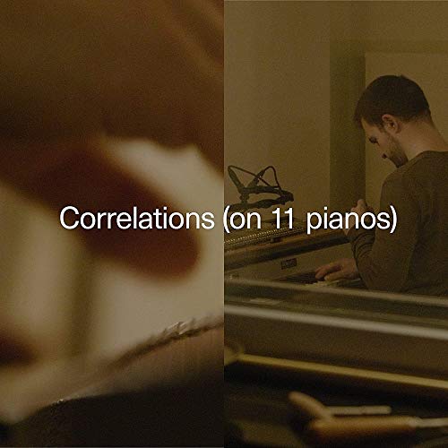 Close-up of piano keys and a man playing, album cover art.