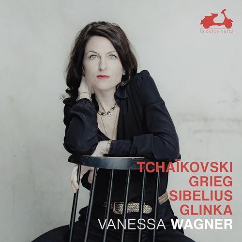 CD cover featuring pianist Vanessa Wagner in a dark jacket, red background.