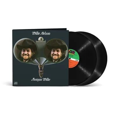 Willie Nelsonās āShotgun Willieā vinyl record with album cover and black disc.