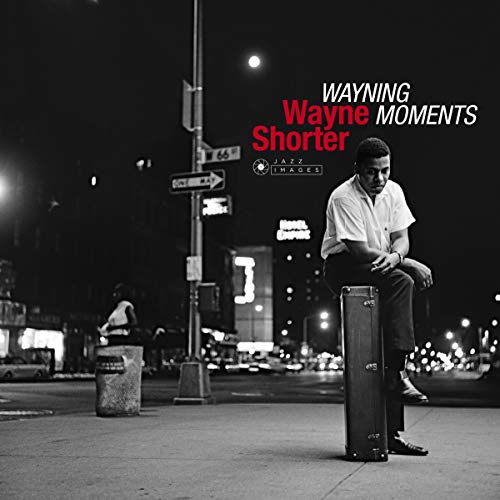 Wayne Shorter album cover: black and white photo of a man with a suitcase.