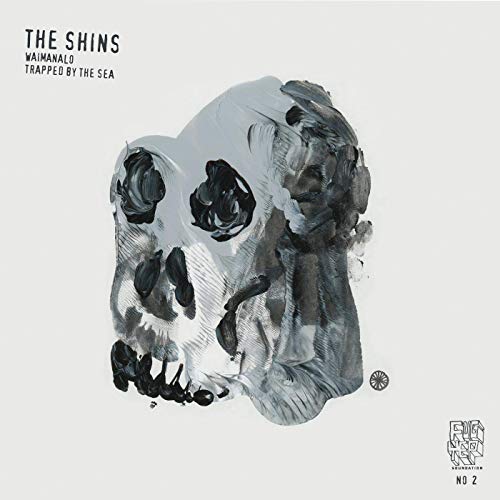 Vinyl record cover: grayscale skull painting with text "Waimanalo.