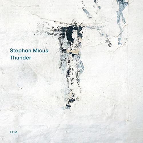 CD cover for Stephan Micus’ “Thunder” with abstract, dark central image.