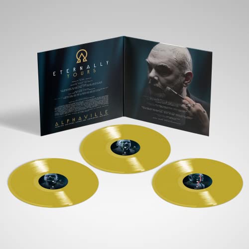 Open vinyl record gatefold with Alphaville album art and two gold records.