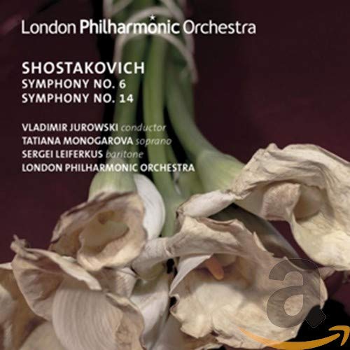 CD cover featuring close-up of white calla lilies against a dark background.