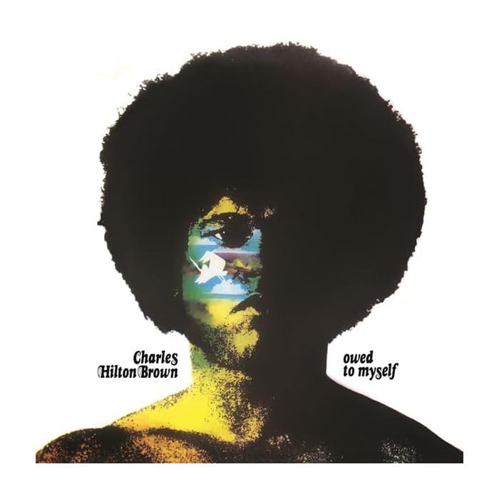 Album cover featuring Charles Hilton Brown with an afro and colorful face.