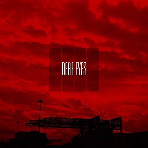 Red sky over silhouetted structures with the text “Deaf Eyes” centered.