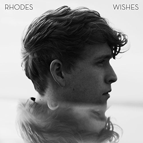 Black and white album cover for Rhodes’ “Wishes” featuring a man’s profile.