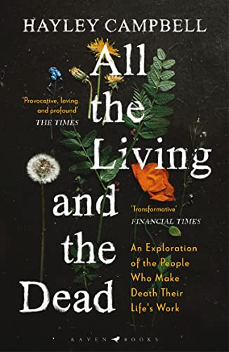Book cover with white text and pressed wildflowers on a black background.