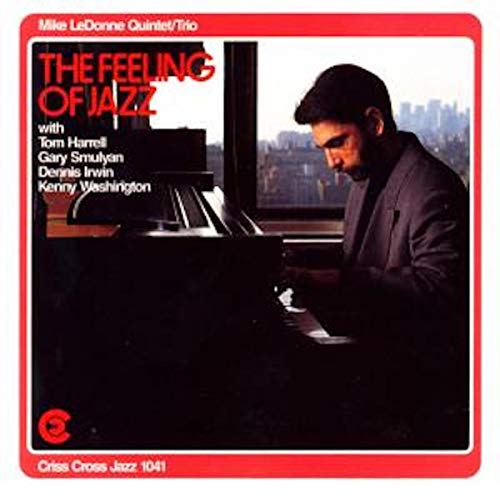 CD cover: pianist Mike Ledonne playing, city view through window.