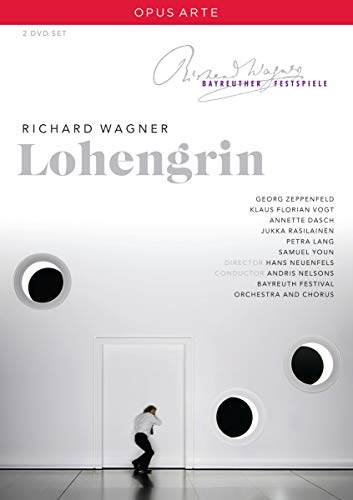 DVD cover for Wagner’s *Lohengrin* opera, featuring a lone figure before a door.
