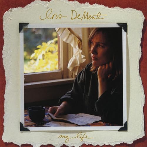 Album cover for Iris Dement’s “My Life” featuring a woman by a window.