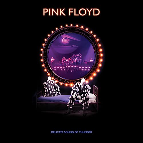 Pink Floyd album cover: band performing within a circular light frame.