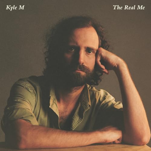 Album cover for Kyle M’s “The Real Me” featuring a portrait of the artist.