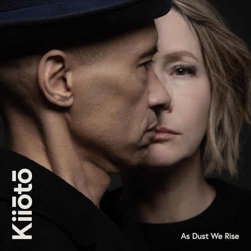 Close-up of two faces, a man and a woman, with album title text.