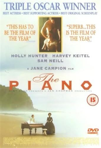 DVD cover for "The Piano" featuring a woman at a piano on a beach.