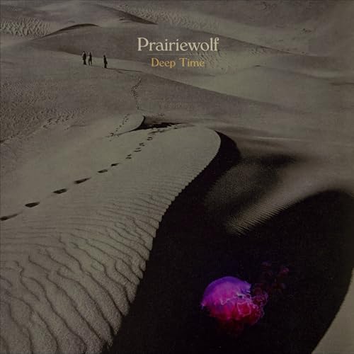 Album cover: desert landscape with figures and a glowing orb.