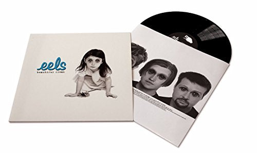 Eels' "Beautiful Freak" vinyl record with black disc and white album cover.